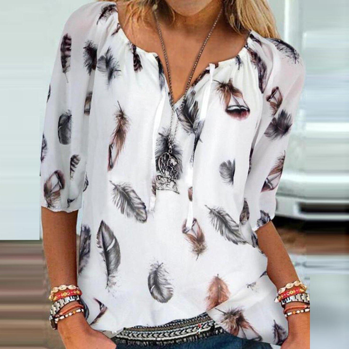 Elegant Feather Print Short Sleeve Top